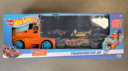 OUTLET Hot Wheels pojemna Ciężarówka Transporter + 2 kolorowe autka samochodziki wyścigowe i akcesoria drogowe  WADLIWY